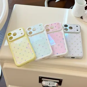 Détail de quatre coques iPhone 17 Pro Max colorées à pois et paillettes en tons pastel.