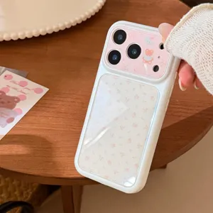 Macro view of a cute floral iPhone case with a pink bear camera protector panel.