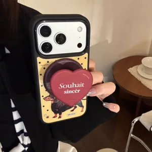 Coque iPhone 16 avec motif teckel et support de poignée en forme de cœur rouge