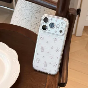 Detail shot of a transparent iPhone case featuring cute cartoon bear and animal patterns.