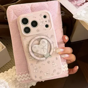 Close-up detail of pink bunny pattern phone case featuring a magnetic heart-shaped kickstand
