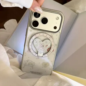 Vue détaillée de la coque iPhone cartoon avec support d'anneau magnétique en cœur.