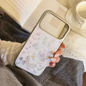 Detail view of electroplated iPhone case with glittery butterfly oil painting design