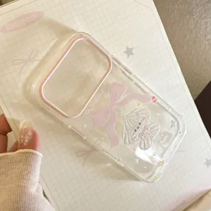 Detailed view of sweet cream puppy and pink bow design on transparent iPhone case
