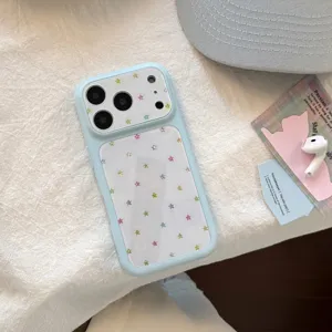Close-up of light blue iPhone case with colorful glitter star pattern