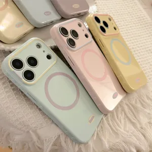 Vue détaillée de coques iPhone compatibles MagSafe aux tons pastel vert, rose et jaune.