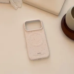 Gros plan d'une coque iPhone à éclaboussures roses avec anneau magnétique
