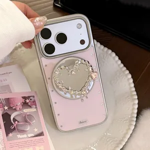 Coque iPhone rose avec support miroir en forme de cœur en métal liquide pour MagSafe