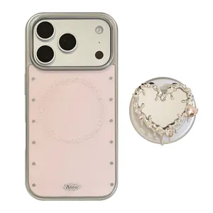 Coque iPhone rose avec placage métallique et support magnétique en forme de cœur