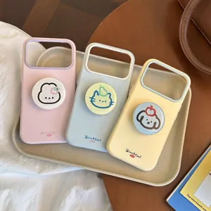 Gros plan de coques iPhone tête d'animal mignonnes avec supports ronds en couleurs pastel