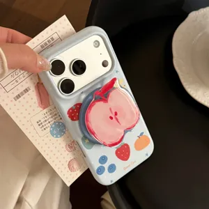 Detail of light blue iPhone case featuring cute fruit graffiti and a 3D pink apple grip stand