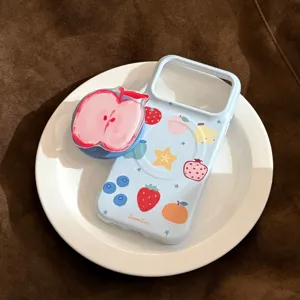 Close-up of fresh blue iPhone case featuring fruit graffiti and an apple pop socket