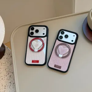 Close-up of vintage striped iPhone cases with heart-shaped magnetic ring stands
