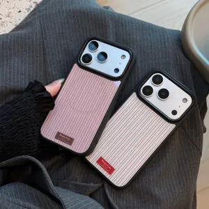 Detailed shot of American vintage striped phone cases for iPhone in pink and white colors