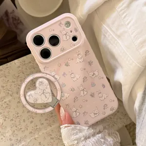 Detailed view of pink cartoon rabbit iPhone case with matching heart ring stand