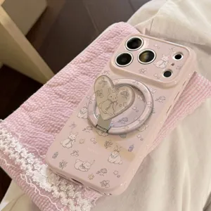 Detailed view of cute pink phone case featuring rabbit art and heart ring holder