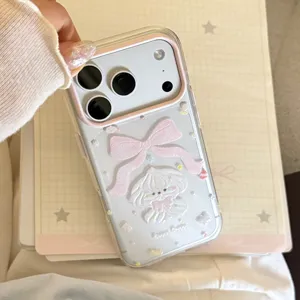 Detailed view of sweet cream puppy iPhone case featuring glitter finish and pink bow