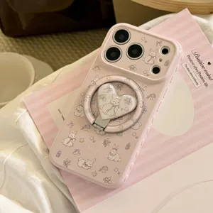 Detailed view of pink iPhone case with cartoon bunny pattern and magnetic heart ring stand.