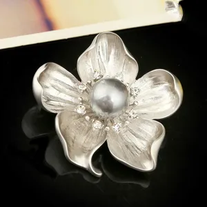 Vintage silver-toned flower brooch with grey pearl and sparkling crystal accents