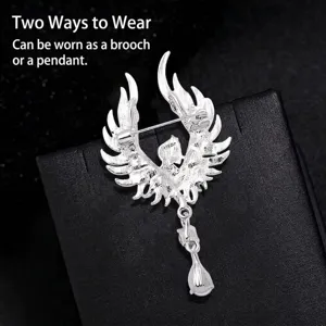 Elegante broche de alas de ángel en plata con diamantes de imitación y lazo para colgante