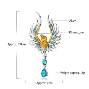 Elegante broche de alas de ángel con diamantes de imitación azules y busto dorado
