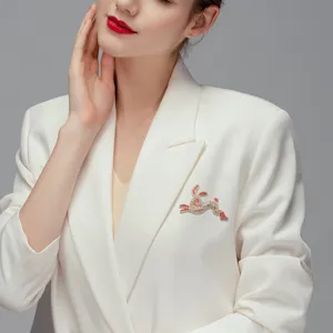 Pink rhinestone rabbit brooch animal pin on white blazer for women elegant accessory