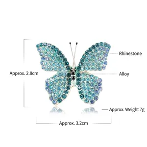 Elegante spilla a farfalla decorata con strass scintillanti blu e verdi per donna