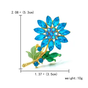 Prachtige blauwe zonnebloem broche met strass en emaille bladeren inclusief maat en gewicht