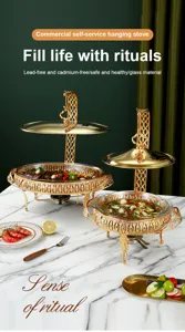 Detailed view of luxury gold stainless steel buffet chafing dish with glass pan