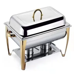 Full view of a rectangular stainless steel chafing dish with elegant gold accents.