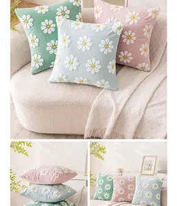 Decorative velvet pillow covers with embroidered daisy patterns in pastel colors.