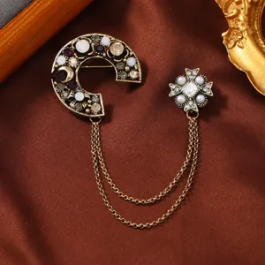Vintage style gold crescent moon and star brooch set with tassel chain and pearls