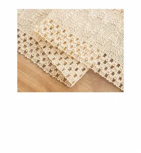 Macro view of bohemian hollowed-out woven table runner texture and fringe detail