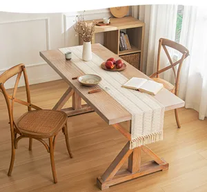 Bohemian hand-woven linen table runner with elegant hollow design and fringe details