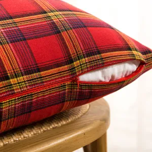 Close-up of red plaid Christmas throw pillow cover featuring a hidden zipper design