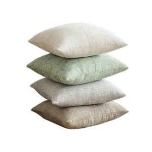 Stacked Japanese minimalist chenille pillow covers in neutral earthy tones for sofa deco