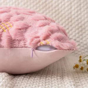 Soft pink embroidered plush cushion cover with hidden zipper detail for home sofa decor