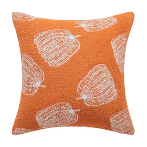 Orange chenille throw pillow cover with white pumpkin pattern for autumn home decor