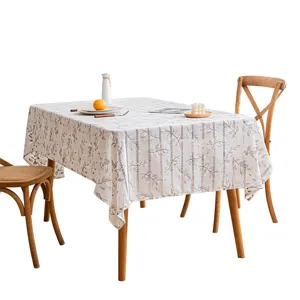 Elegant rectangular linen tablecloth with vertical stripes and floral leaf print design.