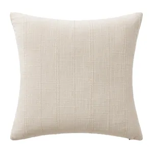 Minimalist cream linen cushion cover featuring subtle vertical stripes for elegant sofa decor