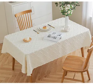 Minimalist cream tufted rectangular tablecloth with 3D geometric pattern for dining decor