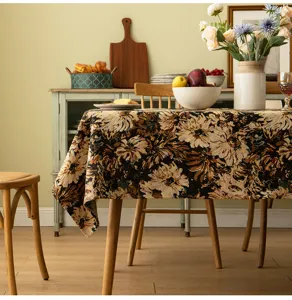 Vintage American Moroccan style floral jacquard tablecloth in a rustic dining setting.