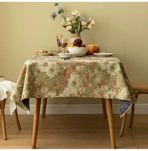 Vintage American Moroccan style jacquard floral tablecloth draped on a dining table