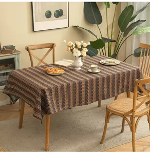 Bohemian geometric jacquard tablecloth displayed in a warm cozy dining room setting