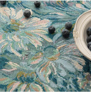 Detailed view of vintage American floral jacquard tablecloth with premium woven texture