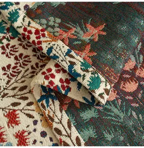 Detailed macro view of American style floral jacquard woven tablecloth fabric texture