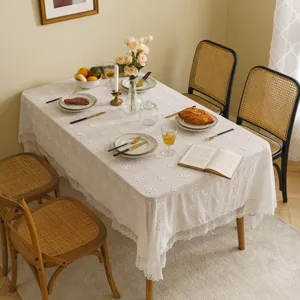 Elegant white lace tablecloth with 3D floral embroidery for rectangular dining tables.
