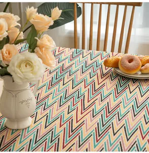 Detailed view of colorful jacquard chevron pattern on a light luxury rectangular tablecloth