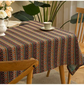 Bohemian geometric pattern tablecloth on a rectangular table close-up display.