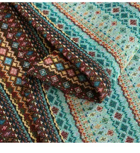 Close-up of geometric pattern on jacquard tablecloth fabric